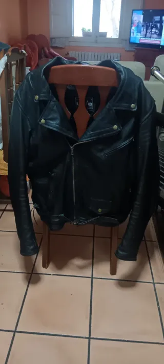 Chaqueta de cuero negra como nueva unisex