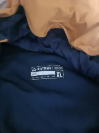 Chaqueta de nieve azul y mostaza