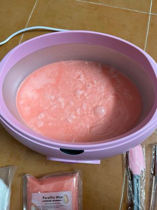 Calentador de parafina rosa