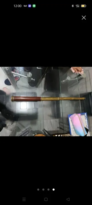 Catalejo antiguo de latón y madera