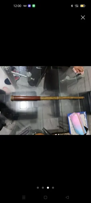 Catalejo antiguo de latón y madera