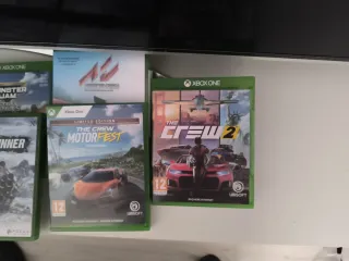 Xbox One con 2 mandos y juegos