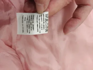 Chaqueta Tweed rosa.