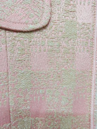Chaqueta Tweed rosa.