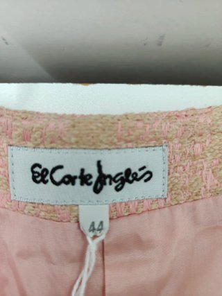 Chaqueta Tweed rosa.