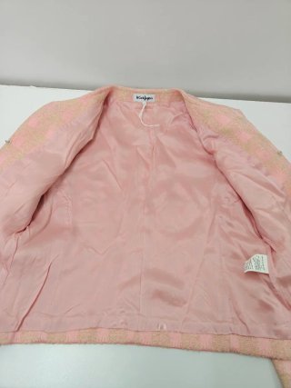 Chaqueta Tweed rosa.