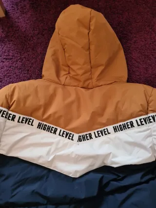 Abrigo niño azul y naranja