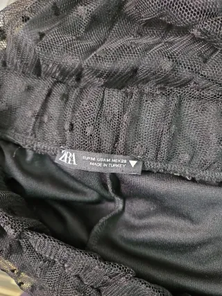 Falda Zara plumeti negra T.M