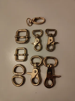 Set fibbie e moschettoni dorati