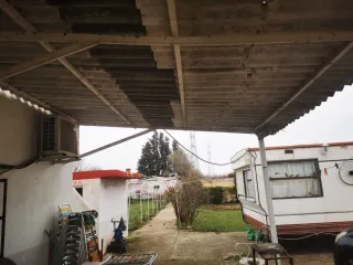 Se vende terreno con casa de campo