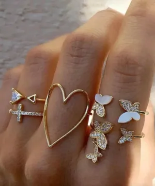 Juego de anillos ajustables mariposa y corazón