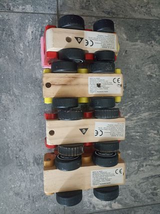 Lote 4 vehículos de madera