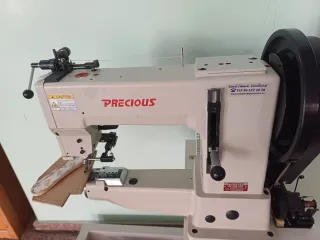 Máquina de coser triple arrastre