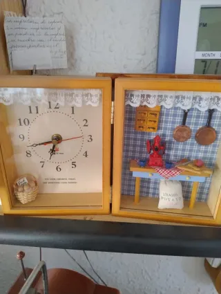 Reloj de pared con pájaros