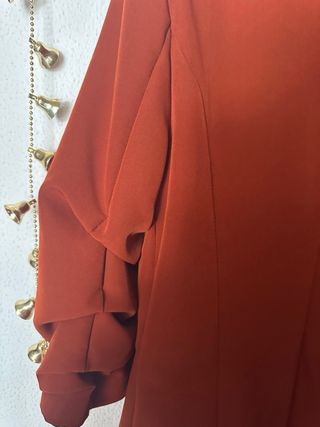 Americana naranja mujer