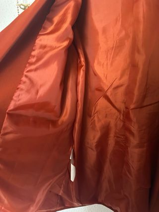 Americana naranja mujer