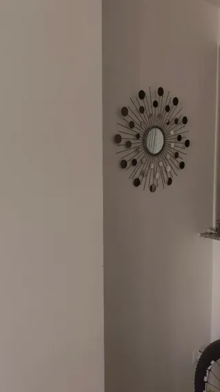 Specchio decorativo a forma di sole