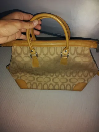 Bolso de mano beige y marrón con estampado