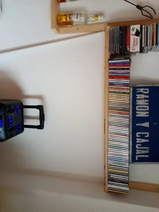 Cadena musical Aiwa con CDs
