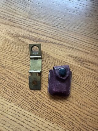 Antigua lupa de bolsillo con funda