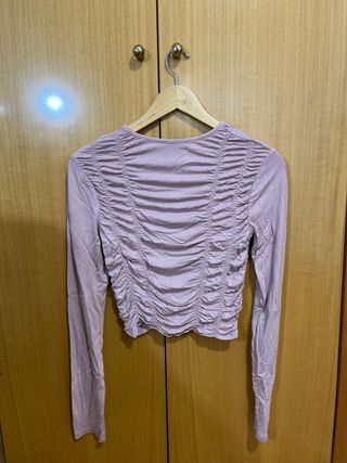 Top rosa fruncido manga larga