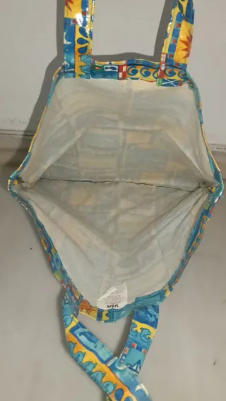 Bolso de tela plastificada con estampado playero