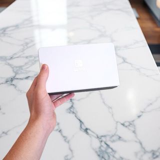 Nintendo Switch OLED + Funda