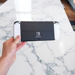 Nintendo Switch OLED + Funda