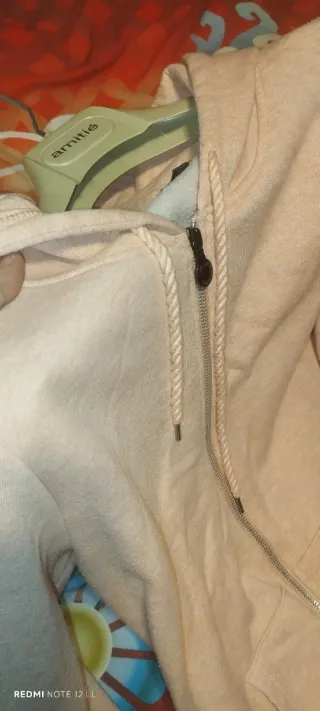 Sudadera salmón con capucha y cremallera