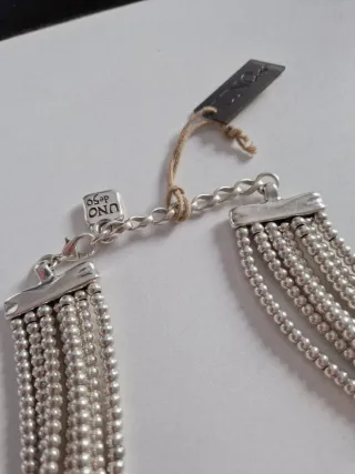 Conjunto de pulsera y anillo Uno de 50