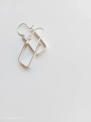 Pendientes largos hecho a mano en plata de ley