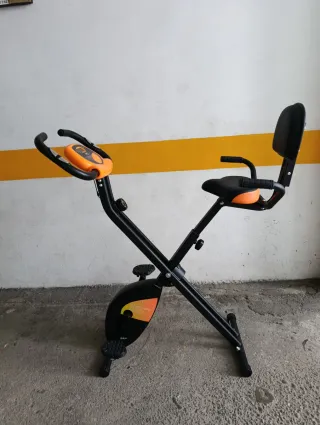Bicicleta Estática Naranja y Negra