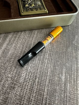 Accendino stile Zippo con decorazione egizia