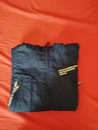 Chubasquero azul talla 11-12 años Prenda nueva