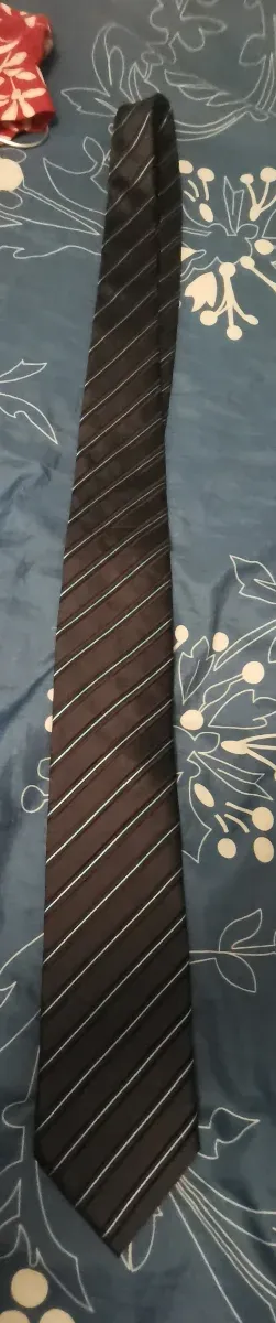 Corbata de rayas azul y turquesa