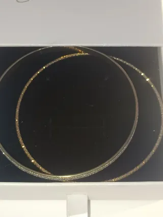 Bracciali rigidi dorati donna