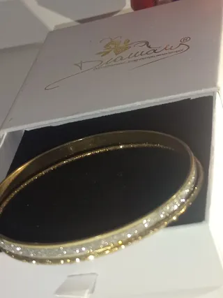 Bracciali rigidi dorati donna