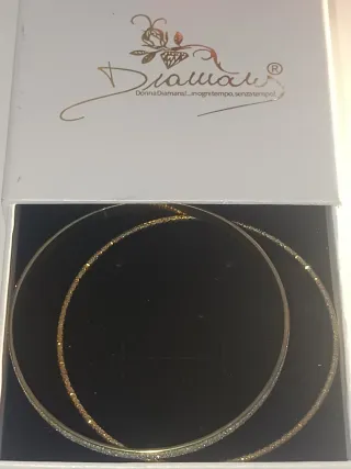 Bracciali rigidi dorati donna