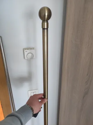 Barra para cortinas dorada