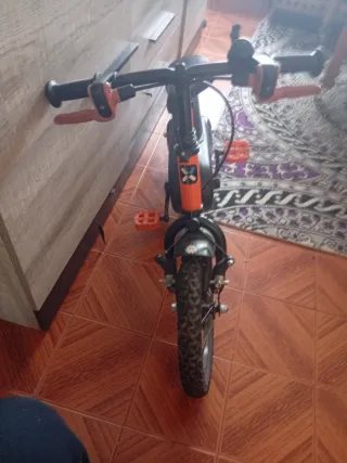 Bicicleta infantil B-twin naranja