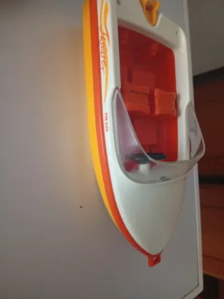 Coches y lancha de Pleymobiles