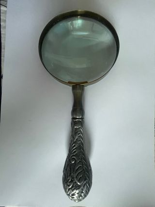 Lupa antigua metal plateado decorada