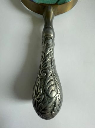 Lupa antigua metal plateado decorada