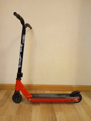 Patinete freestyle infantil rojo (7-10 años aprox.