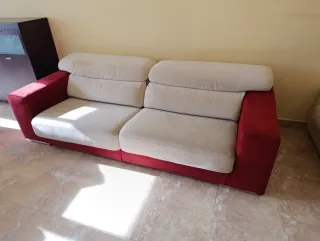 Dos sofás de tela usados