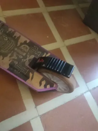 Patinete morado para niña.