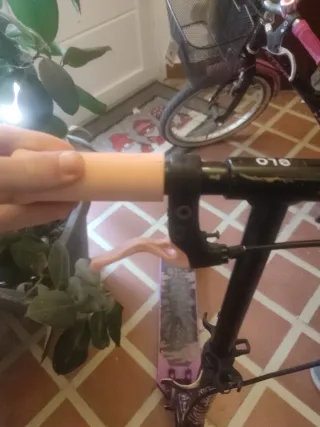 Patinete morado para niña.