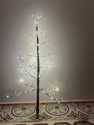 Candelabro de metal dorado floral