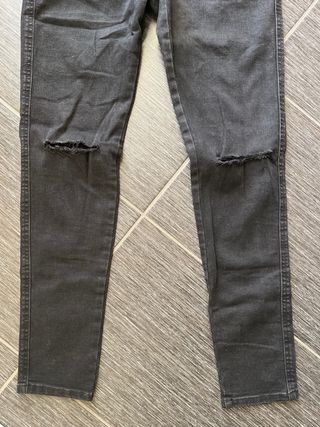 Salopette in denim nero con zip