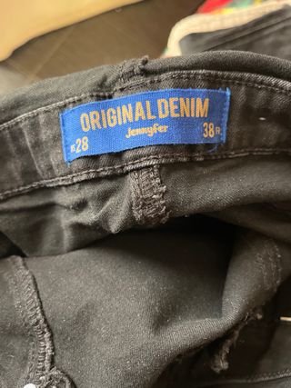 Salopette in denim nero con zip